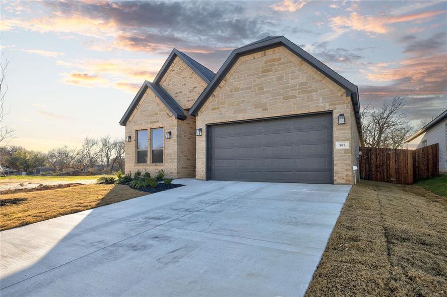 View of front of home featuring a garage