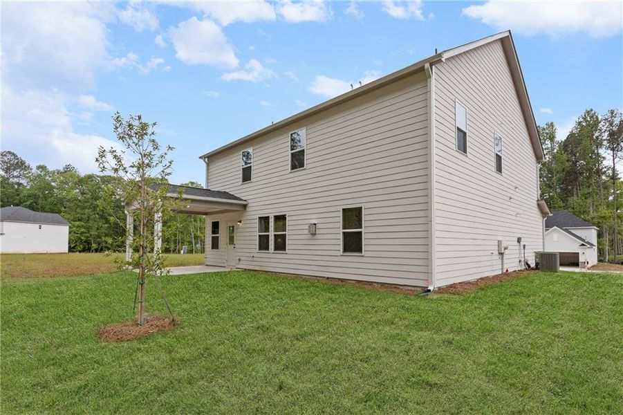 Front exterior of a new home in , Villa Rica, GA, highlighting curb appeal (Image 2).