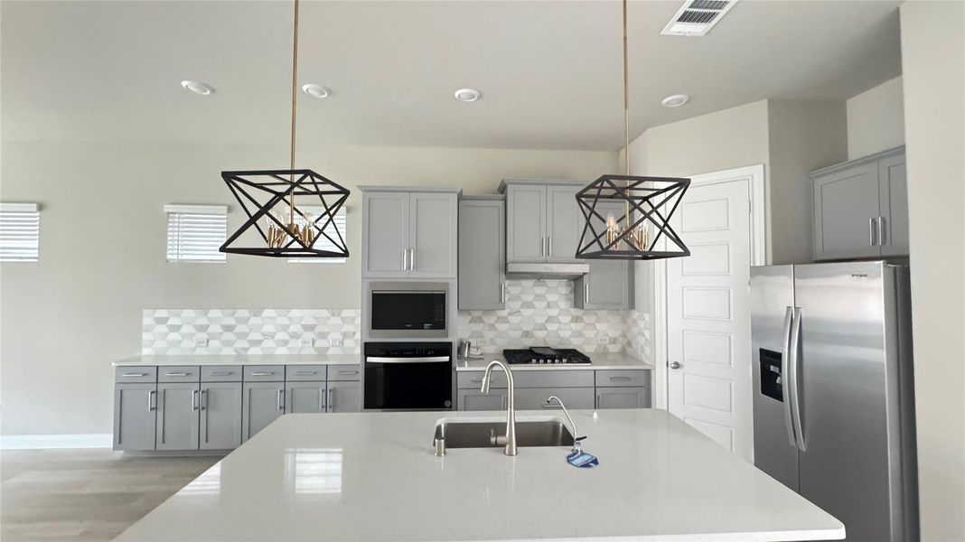 Furnished interior view inside a new home in Dunvale Village - Patio Home Collection, Houston (Image 3). Furnished interior view inside a new home in Dunvale Village - Patio Home Collection, Houston (Image 3).