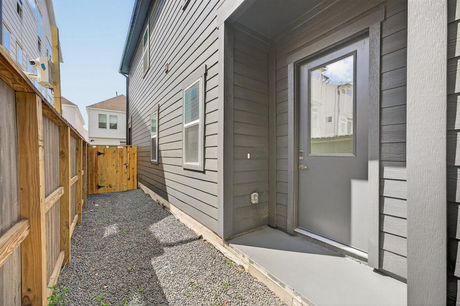 Exterior details and patio area of a home in , Houston (Image 3).