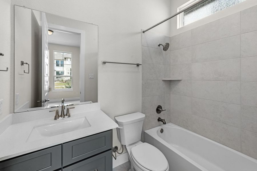 Furnished interior view inside a new home in Bridgeland, Cypress (Image 15).