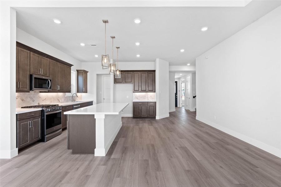 Whether you are relaxing in the great room or greeting guests at the front door, the open sightlines ensure that everyone feels connected, fostering a truly inclusive living experience where isolation is a thing of the past.