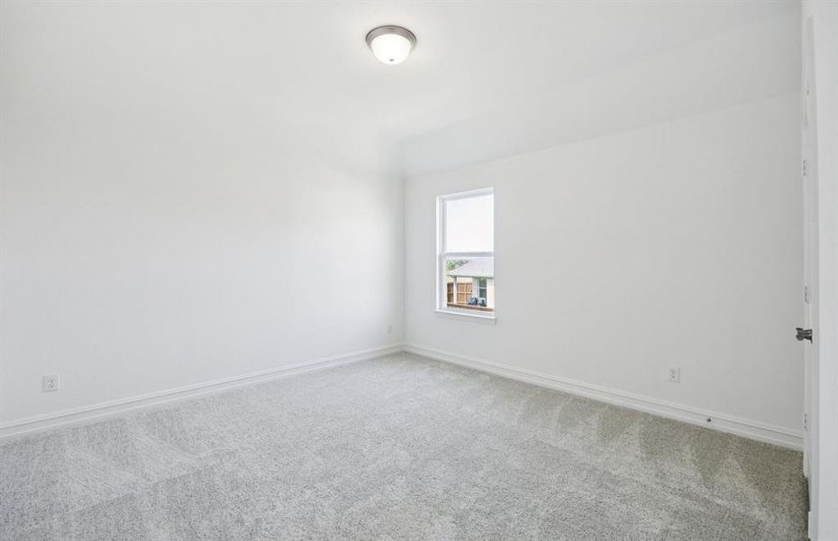 Spacious bedroom with windows