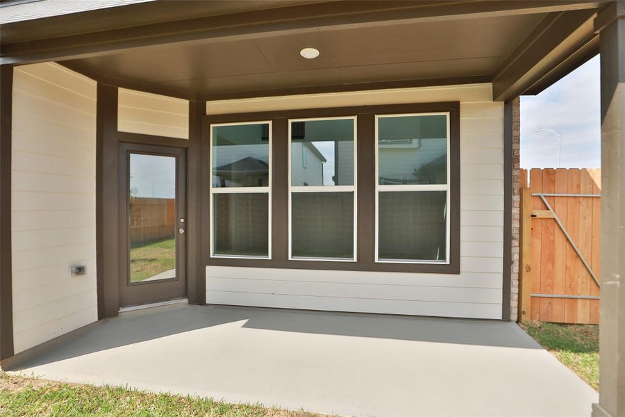 Exterior details and patio area of a home in Beamer Villas, Friendswood (Image 2). Exterior details and patio area of a home in Beamer Villas, Friendswood (Image 2).