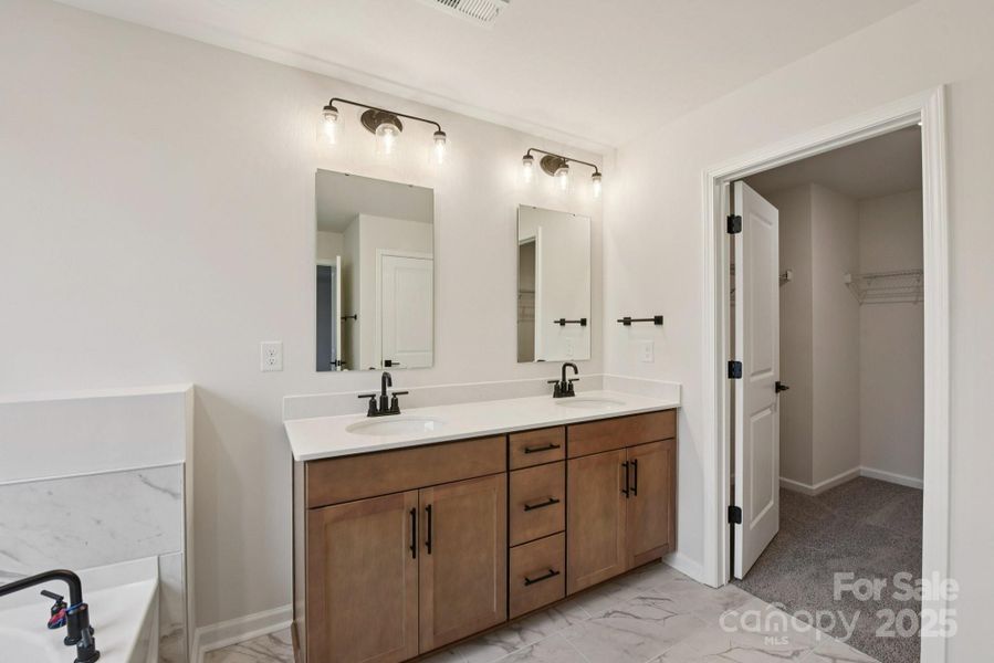 Furnished interior view inside a new home in Sylvan Creek, Denver (Image 3).