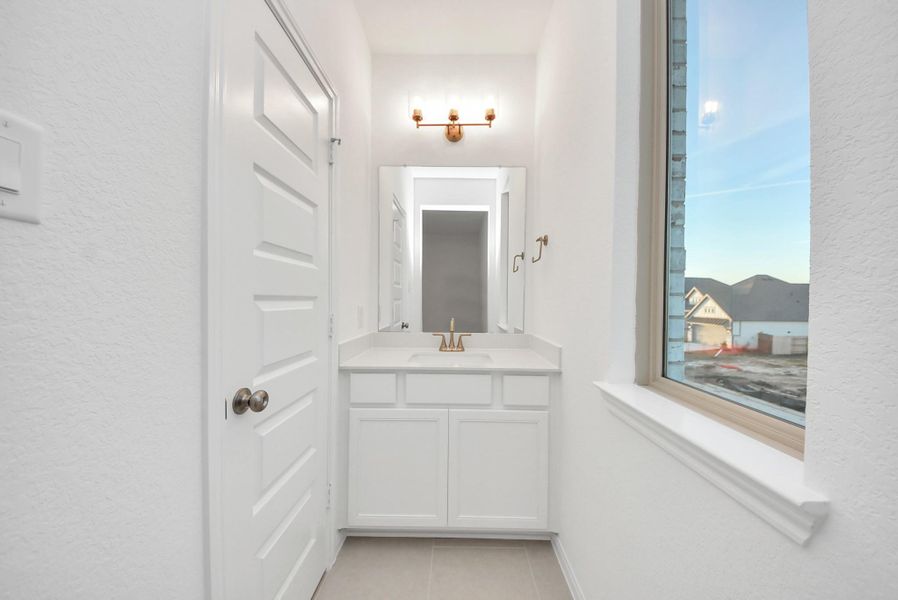 Furnished interior view inside a new home in Elyson, Katy (Image 5).