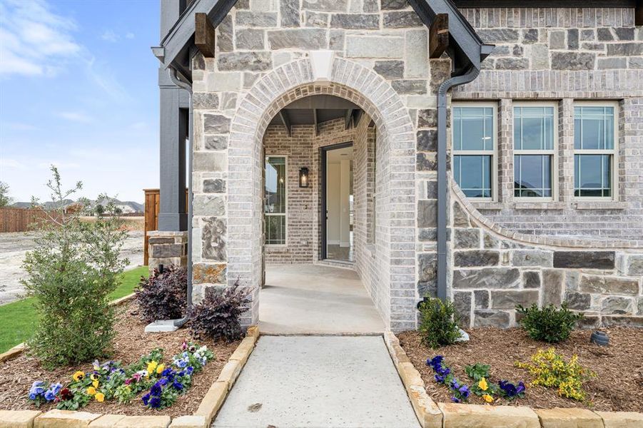 Exterior details and patio area of a home in Sonoma Verde, McLendon-Chisholm (Image 24).