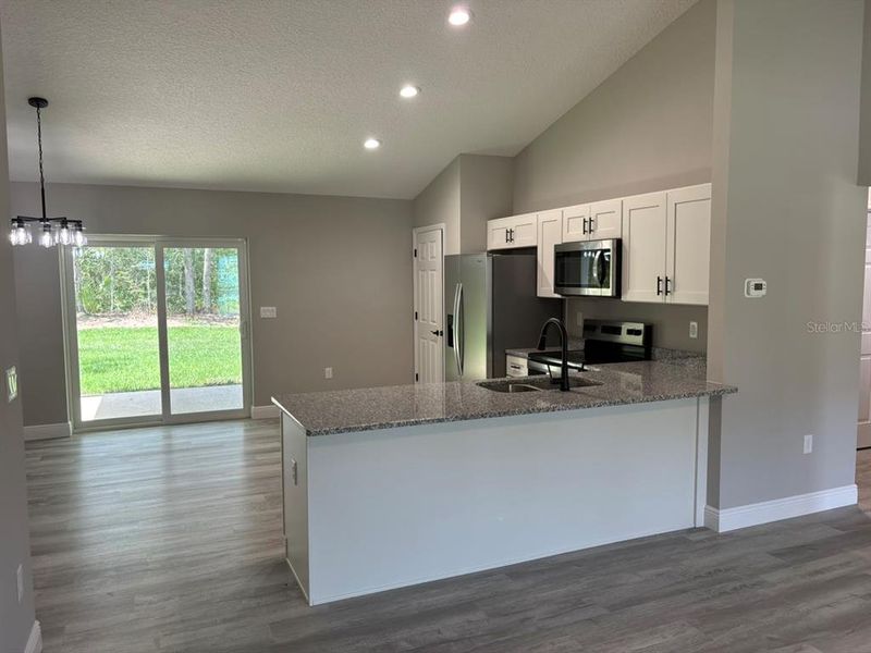 Furnished interior view inside a new home in , Dunnellon (Image 9).