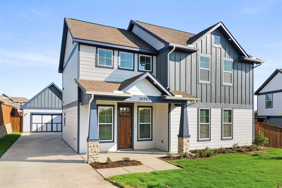 Front exterior of a new home in Heritage Towne, Grand Prairie, TX, highlighting curb appeal (Image 20).