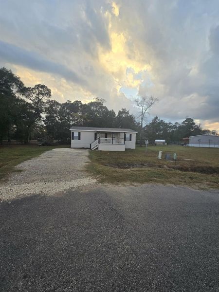 Exterior details and patio area of a home in , Conroe (Image 2). Exterior details and patio area of a home in , Conroe (Image 2).