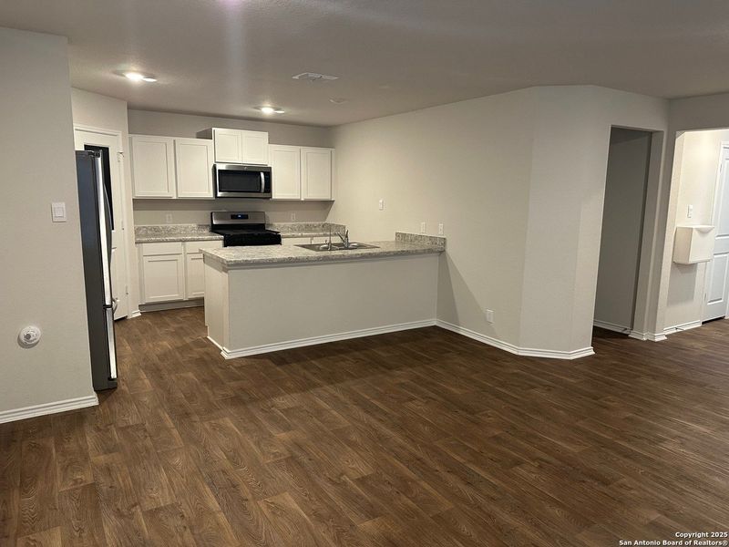 Furnished interior view inside a new home in Valley Ranch, San Antonio (Image 4).