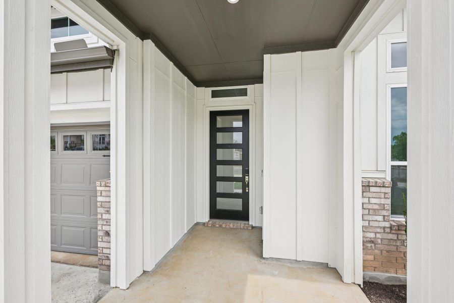 Exterior details and patio area of a home in Persimmon, Buda (Image 18).