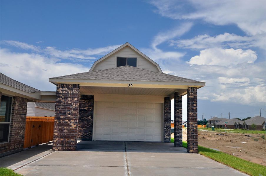 Front exterior of a new home in , League City, TX, highlighting curb appeal (Image 25). Front exterior of a new home in , League City, TX, highlighting curb appeal (Image 25).