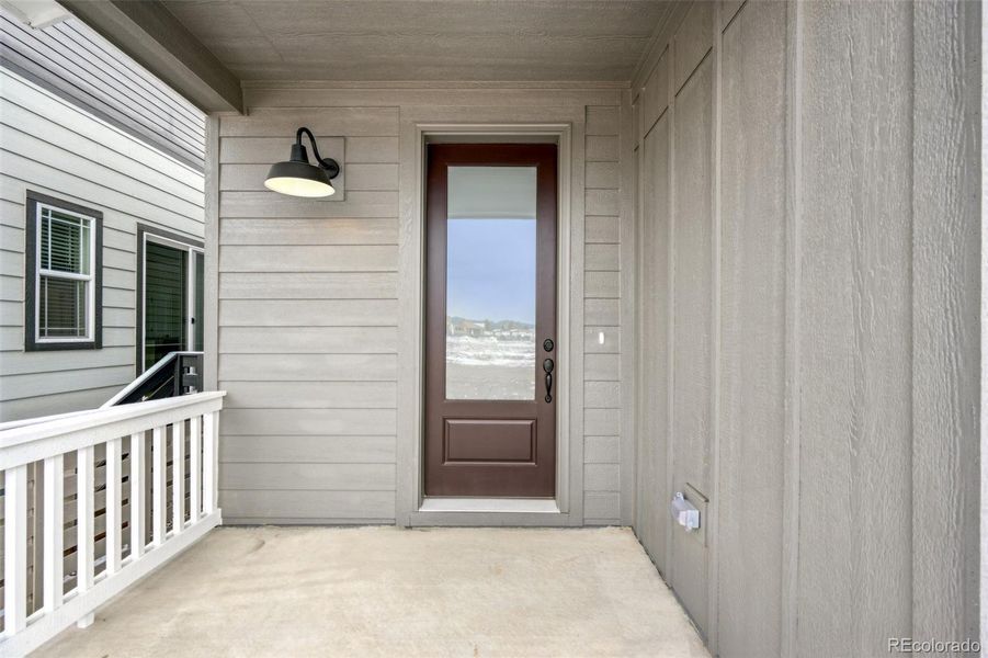 Exterior details and patio area of a home in The Villas Collection at Sterling Ranch, Littleton (Image 24).