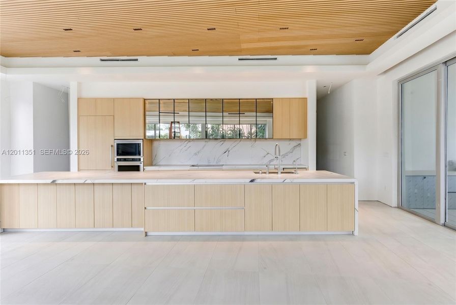 Furnished interior view inside a new home in , Miami Springs (Image 3).