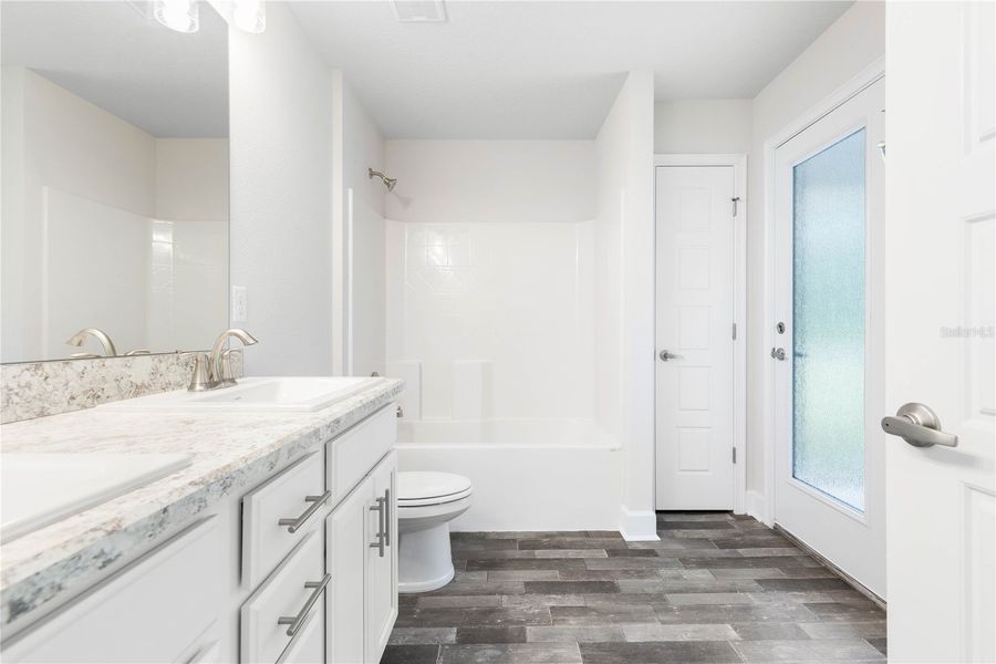 Furnished interior view inside a new home in Orange Blossom Hills, Summerfield (Image 10).
