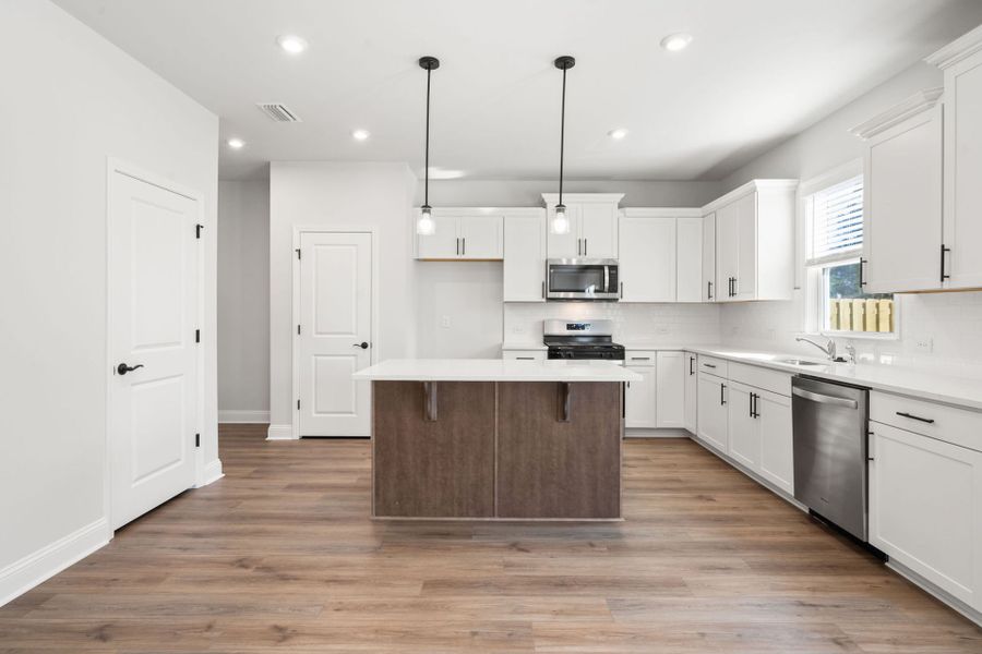 Furnished interior view inside a new home in Salem Bay, Beaufort (Image 9).