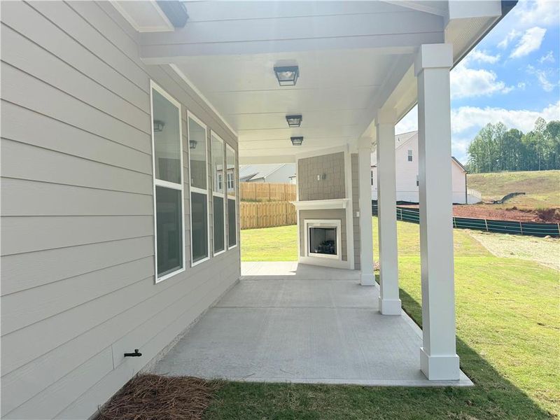 Exterior details and patio area of a home in Ponderosa Farms Reserve, Gainesville (Image 32).