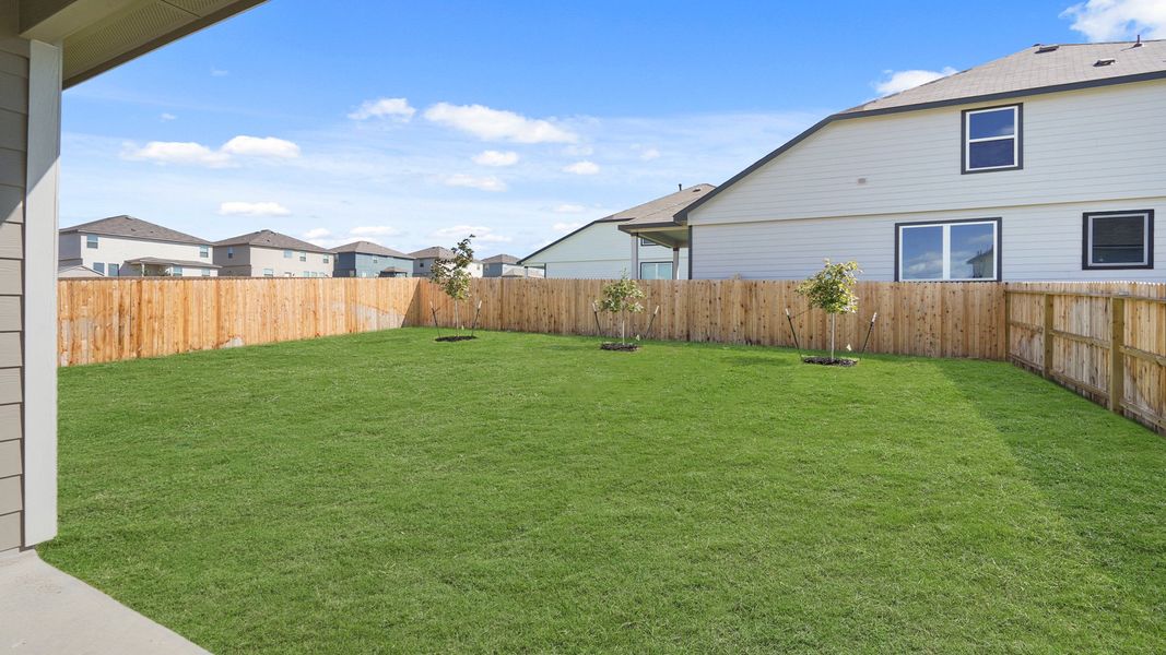 Exterior details and patio area of a home in Hunters Ranch, San Antonio (Image 2).