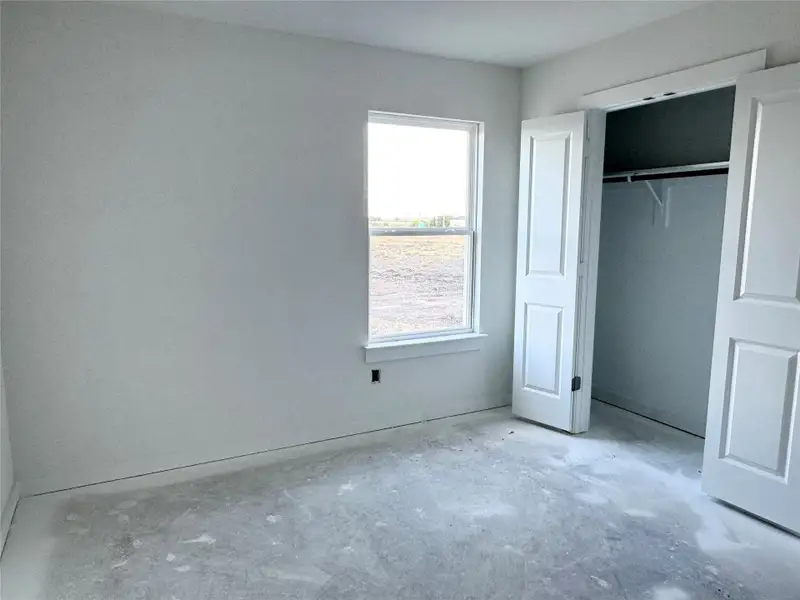 Unfurnished bedroom with a closet