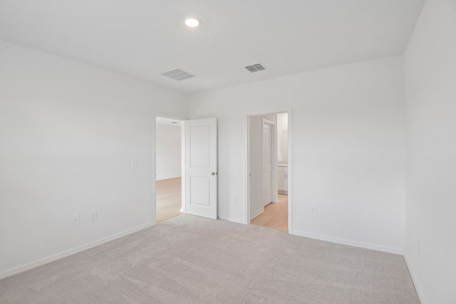 Representative unfurnished interior of a home built from the Blackbird by Taylor Morrison in Westview Community Group Page, Kissimmee (Image 10).