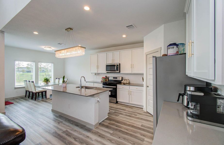 Furnished interior view inside a new home in Parks Edge, Missouri City (Image 4).