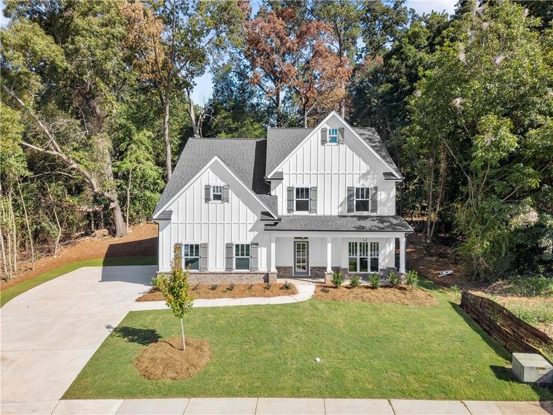 Front exterior of a new home in , Covington, GA, highlighting curb appeal (Image 20). Front exterior of a new home in , Covington, GA, highlighting curb appeal (Image 20).
