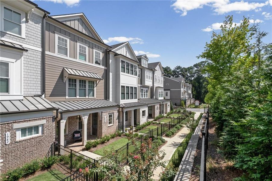 Front exterior of a new home in Devin's Shire, Kennesaw, GA, highlighting curb appeal (Image 24). Front exterior of a new home in Devin's Shire, Kennesaw, GA, highlighting curb appeal (Image 24).
