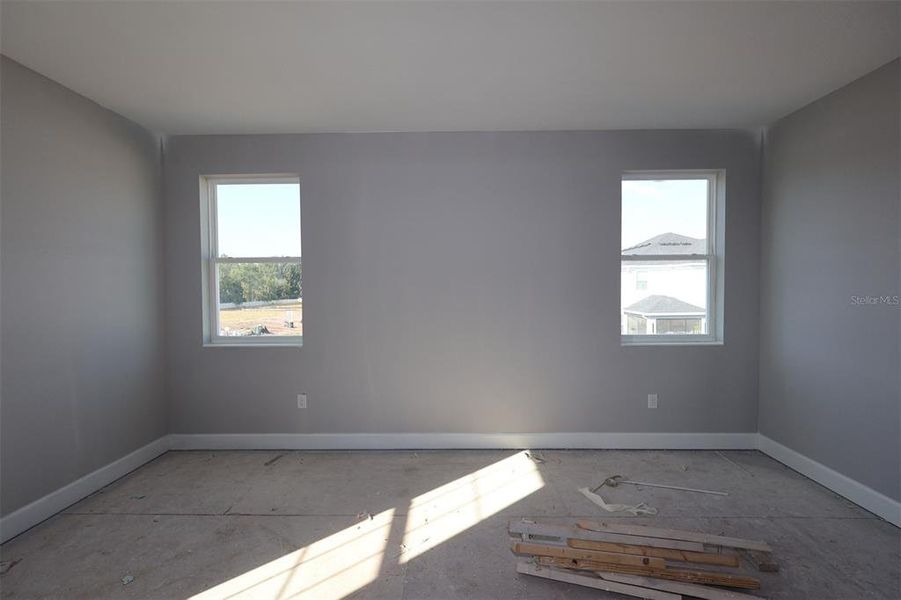 In-progress construction of a new home in Center Lake on the Park, St. Cloud, FL (Image 7).