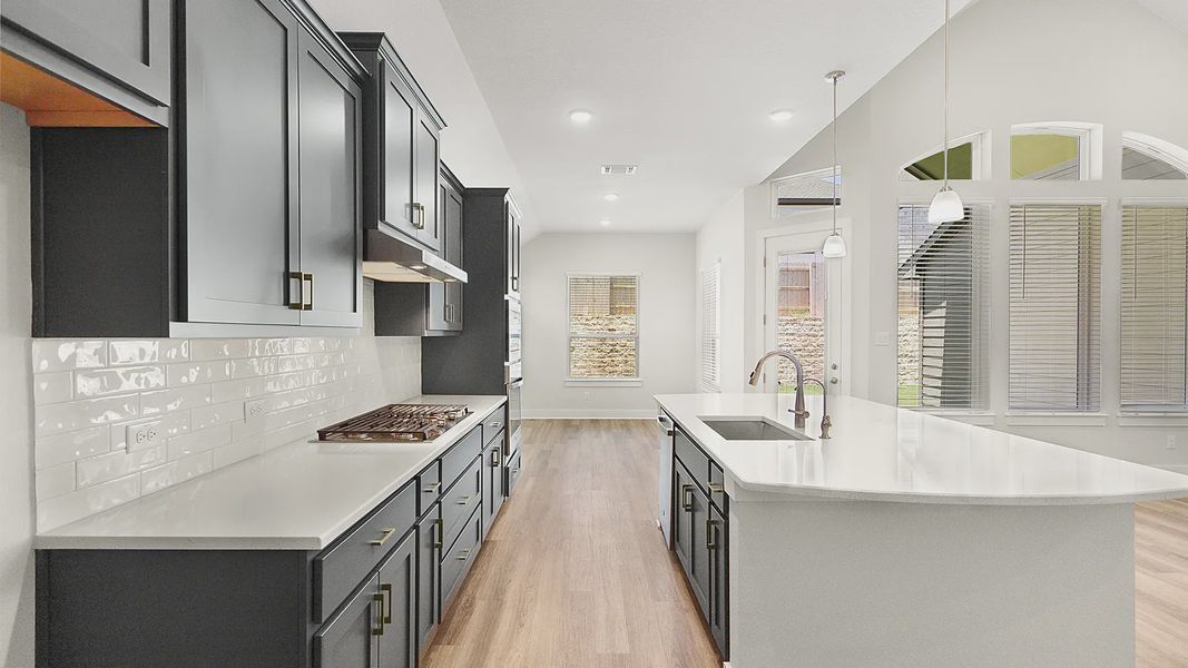 Representative furnished interior of a home built from the Brenner by Chesmar Homes in Newhaven, Manor (Image 12).