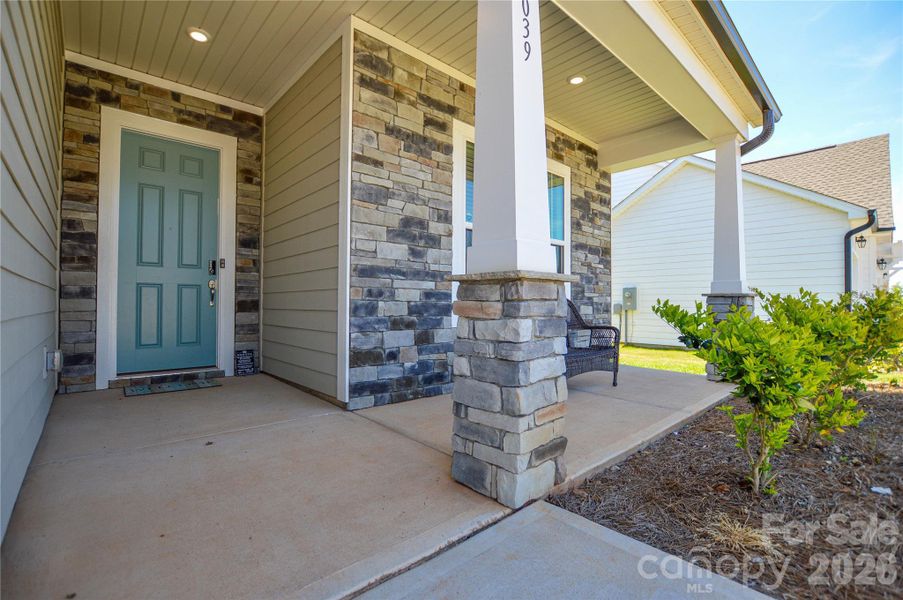Exterior details and patio area of a home in Edgewater Lakeview On Your Lot, Lancaster (Image 25).