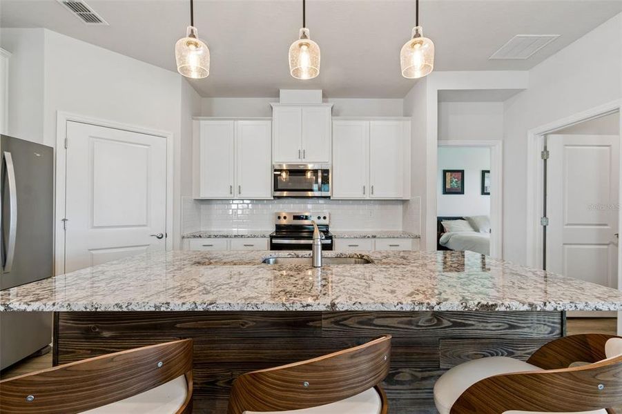 Furnished interior view inside a new home in Star Farms at Lakewood Ranch, Bradenton (Image 10).