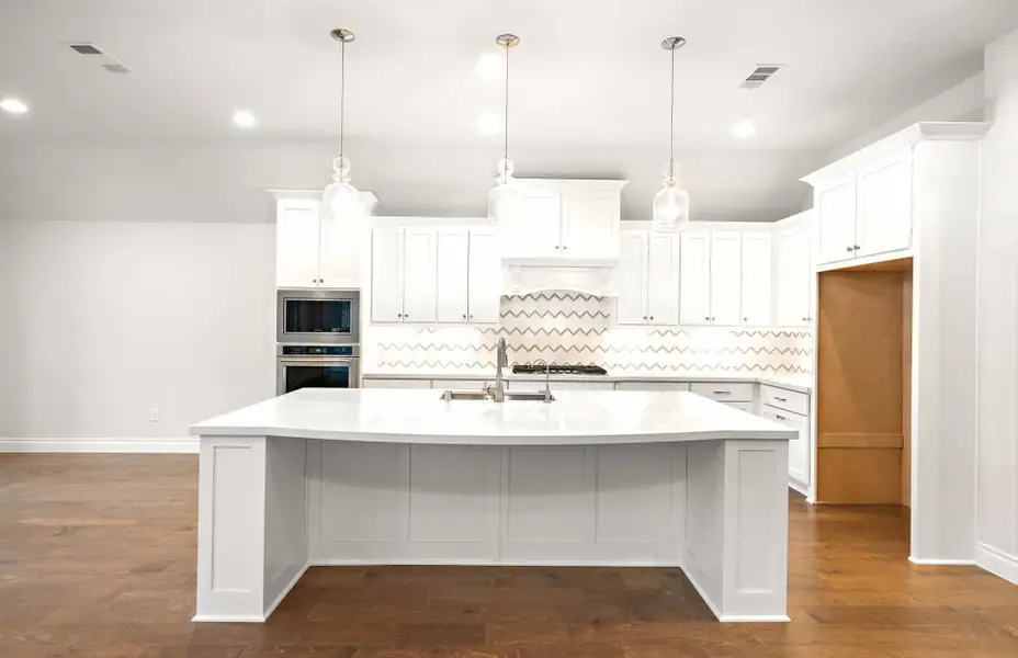 Representative furnished interior of a home built from the 3068 by Ravenna Homes in The Woodlands Hills 65′, Willis (Image 9).