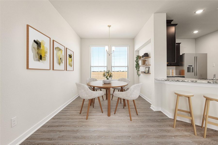 This open-concept kitchen and living area blends modern design with comfort. Featuring gray cabinetry, quartz countertops, stainless steel appliances, and a spacious island, the space is filled with natural light and flows seamlessly into the living room. This open-concept kitchen and living area blends modern design with comfort. Featuring gray cabinetry, quartz countertops, stainless steel appliances, and a spacious island, the space is filled with natural light and flows seamlessly into the living room.