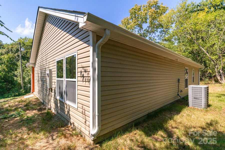 Front exterior of a new home in , Lexington, NC, highlighting curb appeal (Image 14).