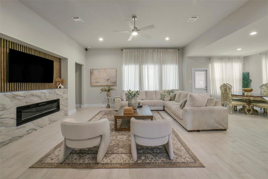 Bright and open living room filled with natural light.