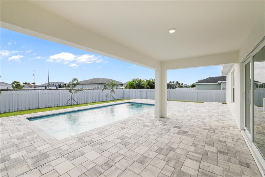 Representative exterior details of a home built from the The Sunset Harbor with Pool by Sunlife Homes LLC in Cape Coral, Cape Coral (Image 4). Representative exterior details of a home built from the The Sunset Harbor with Pool by Sunlife Homes LLC in Cape Coral, Cape Coral (Image 4).