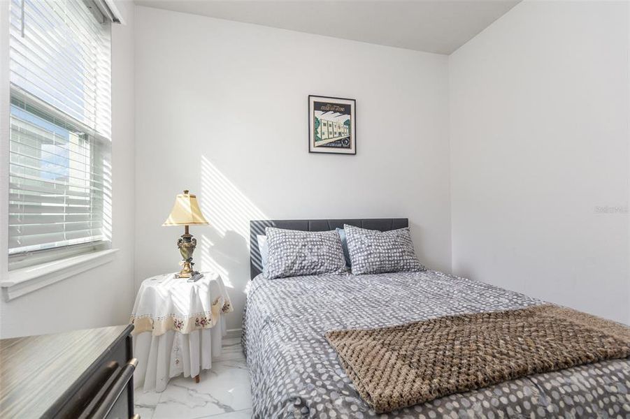 Furnished interior view inside a new home in Tohoqua Reserve, Kissimmee (Image 27).