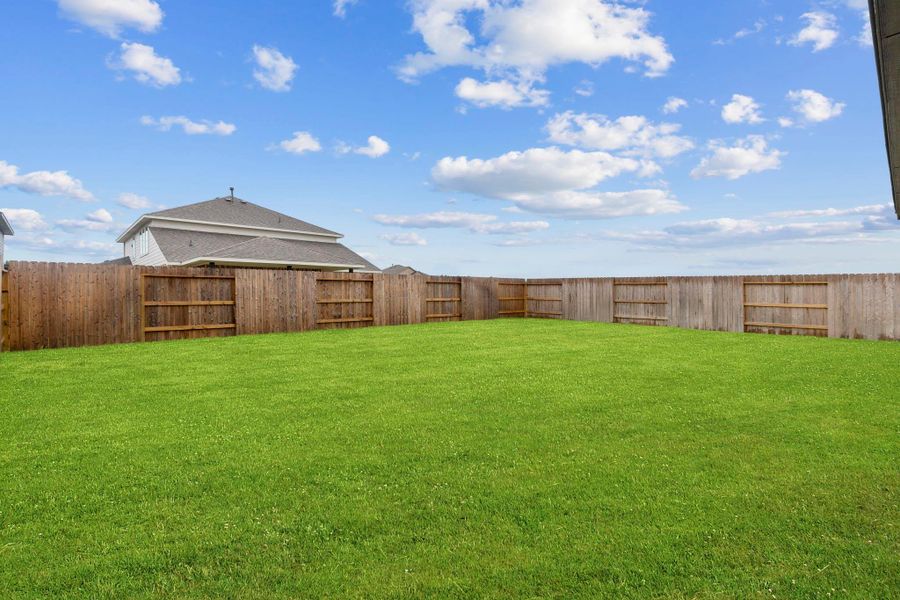Wide-open backyard views with endless possibilities for play, pets, or entertaining.