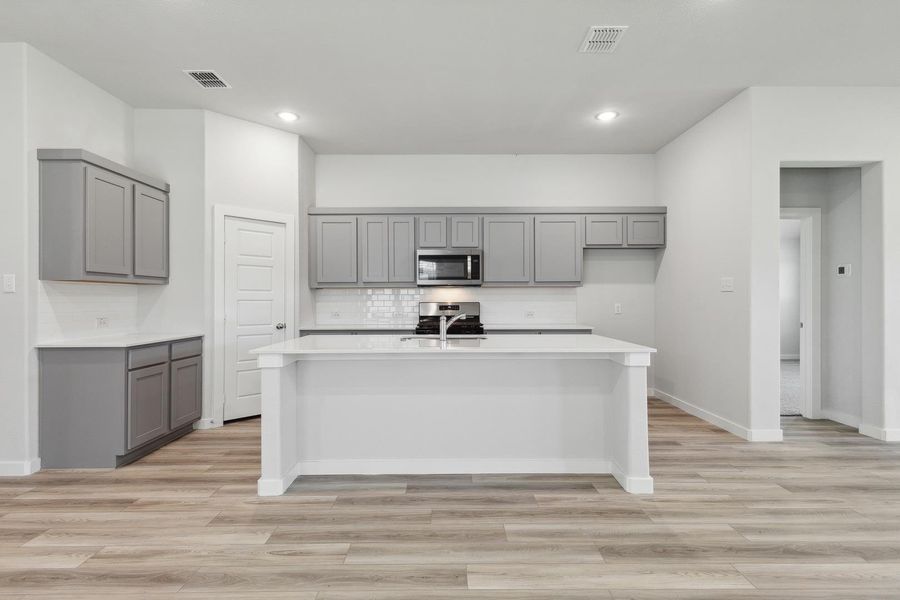 Furnished interior view inside a new home in Prairie Winds, Hutto (Image 6).