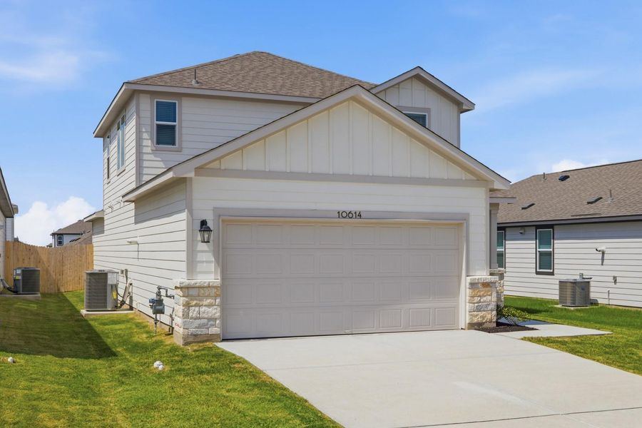Front exterior of a new home in Stallion Run, Buda, TX, highlighting curb appeal (Image 25).