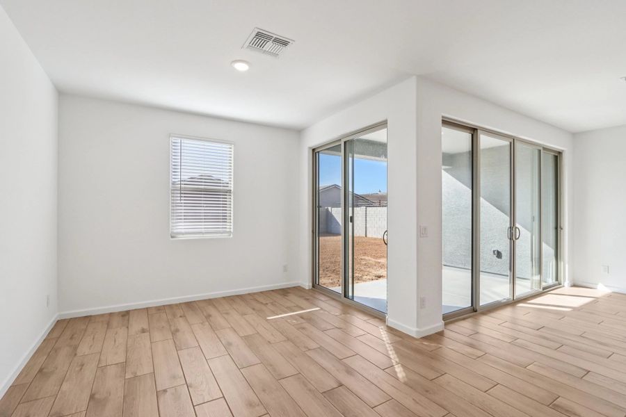Dining with dual sliders. Representative images and renderings are for illustrative purposes. Actual structural options and design finishes of home may vary.