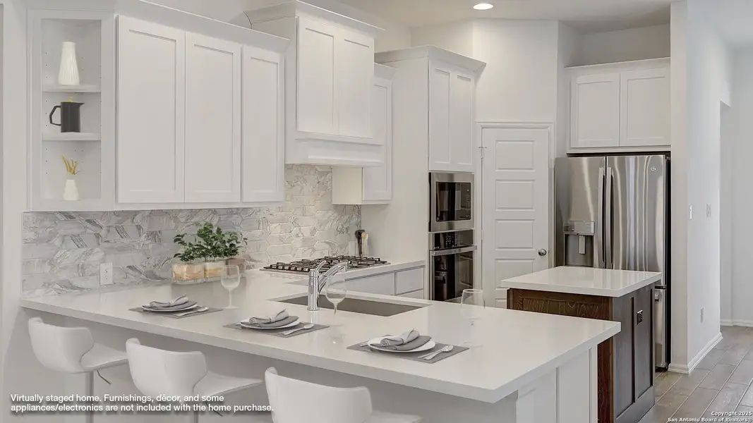 Furnished interior view inside a new home in Ladera 40', San Antonio (Image 8).