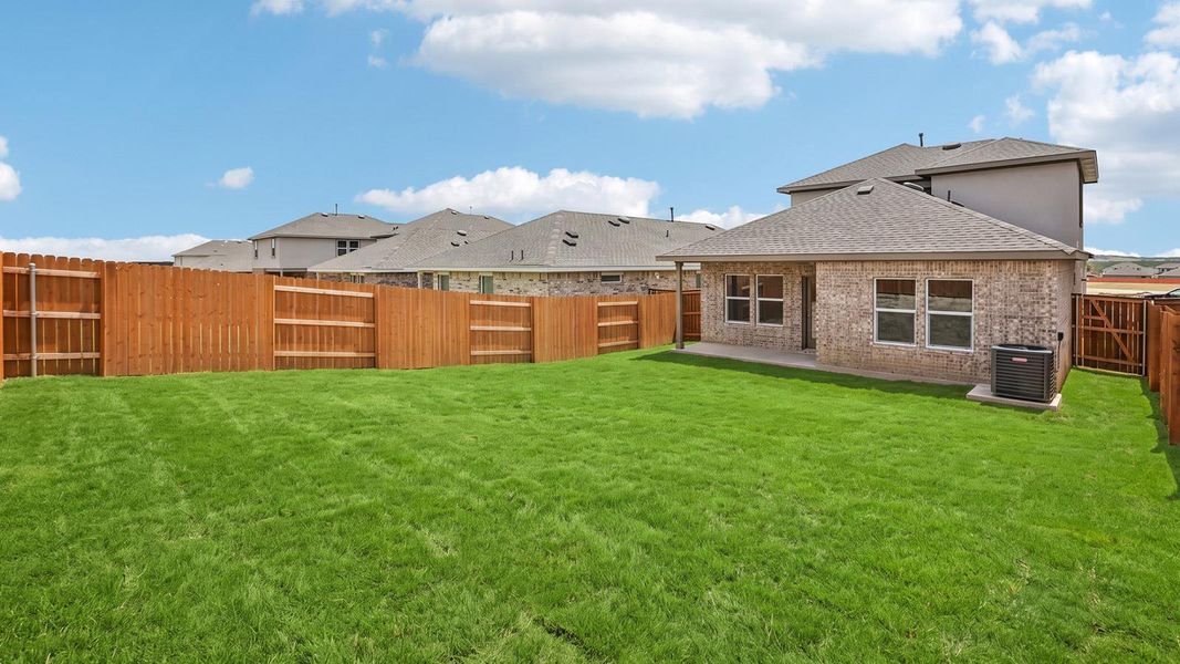 Exterior details and patio area of a home in Bar W Ranch, Leander (Image 3).