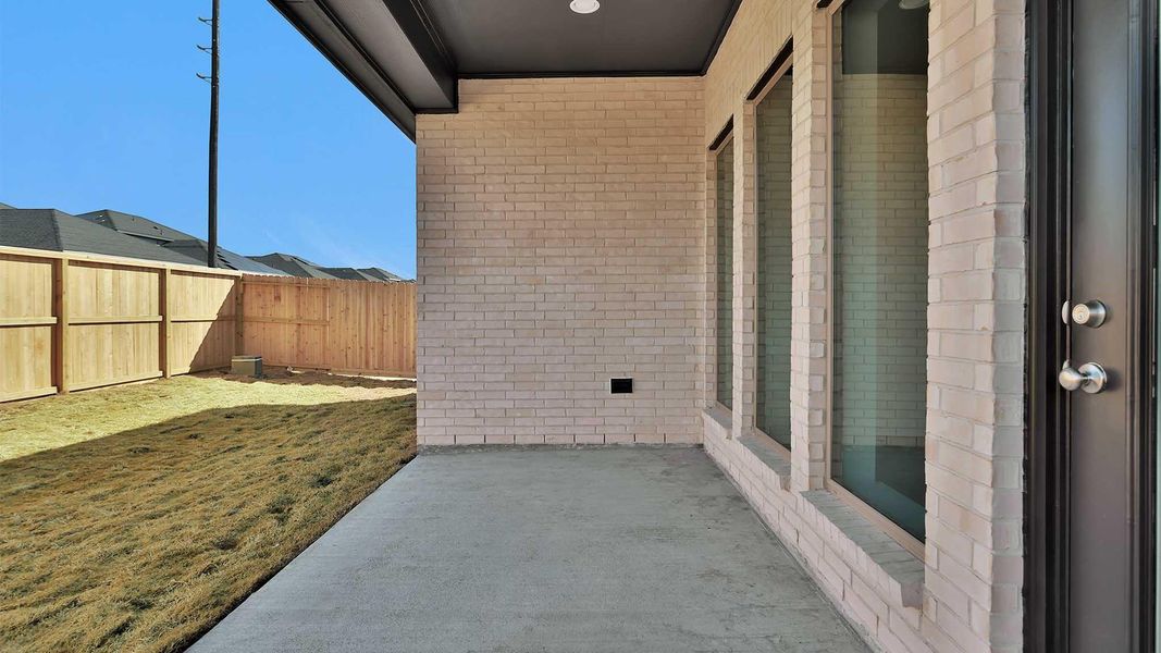 Exterior details and patio area of a home in Cross Creek West, Fulshear (Image 3).