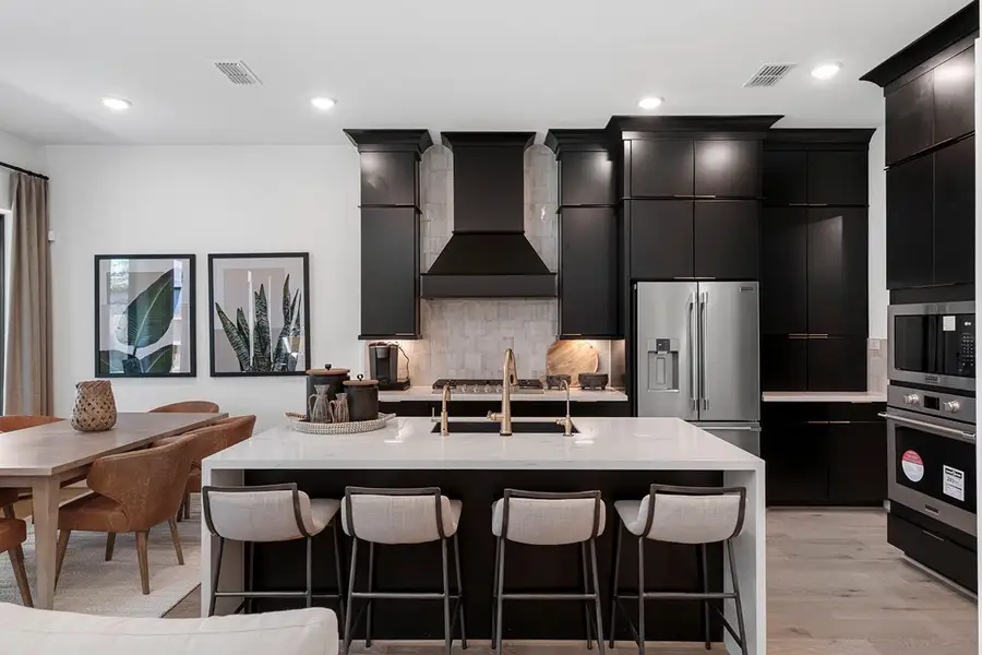 Furnished interior view inside a new home in The Highlands 50', Porter (Image 10).