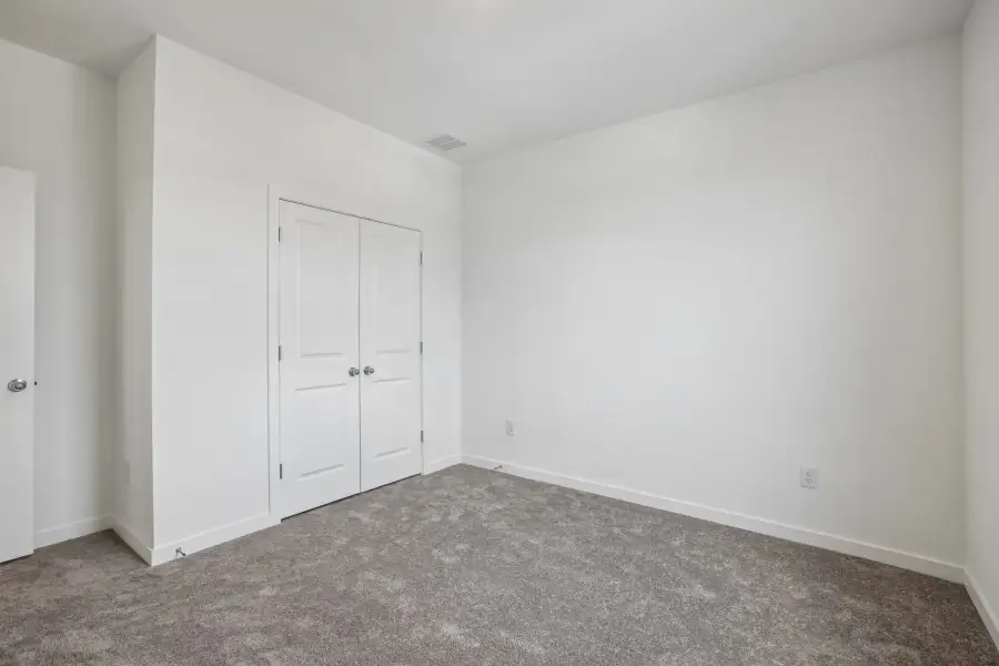 Spacious, unfurnished interior of a new home in Parkton Square, Kyle (Image 29).