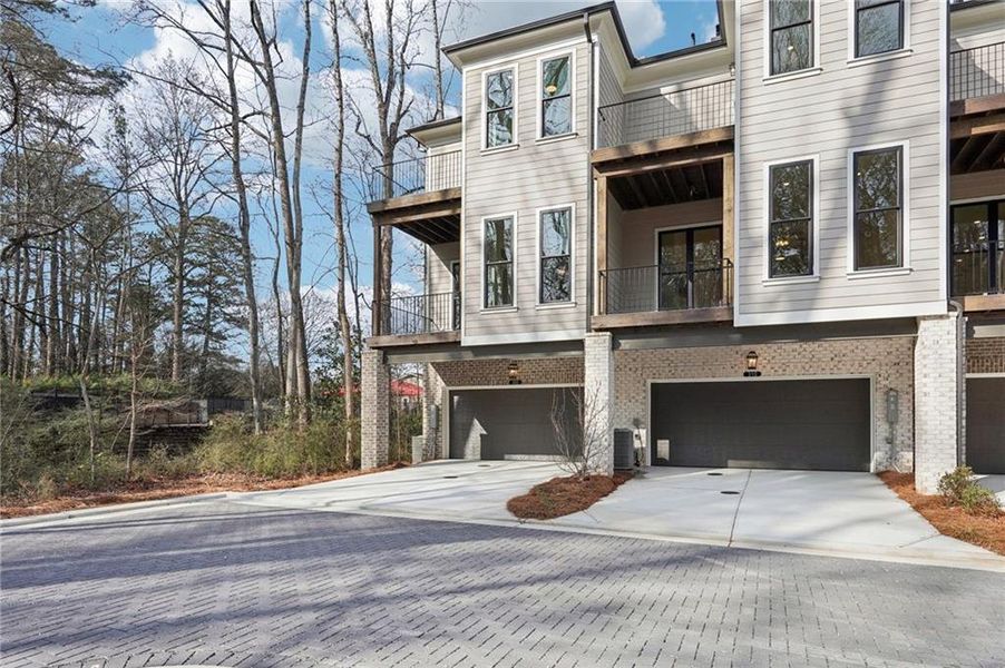 Front exterior of a new home in Byers Park, Alpharetta, GA, highlighting curb appeal (Image 33).