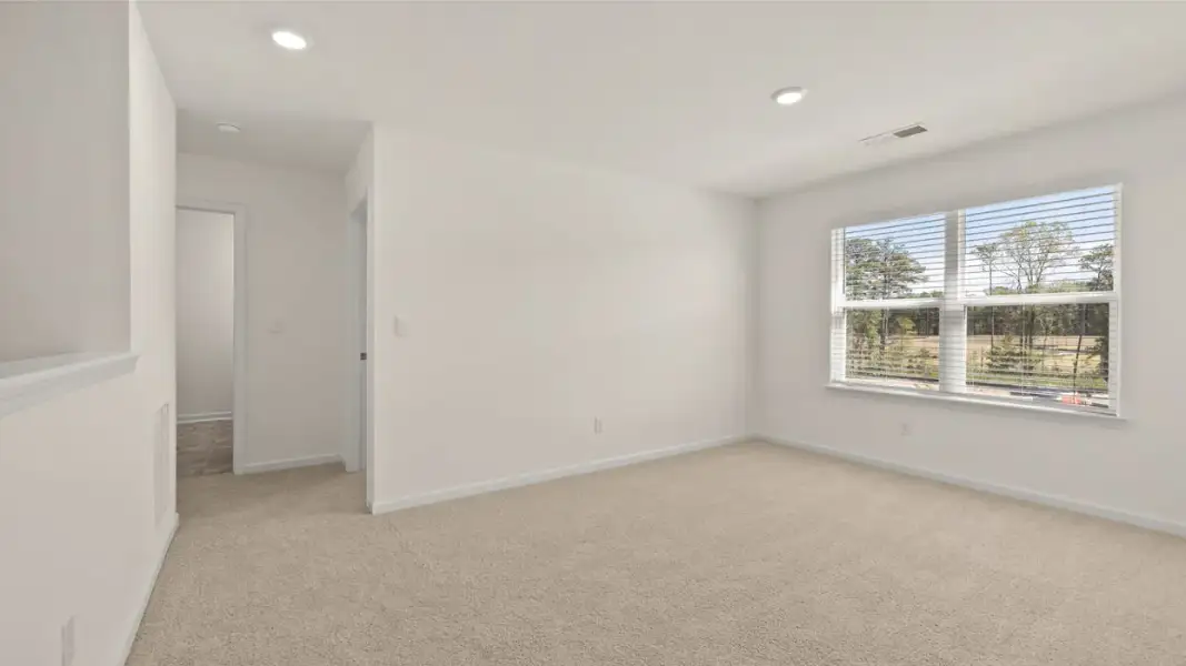 Spacious, unfurnished interior of a new home in The Highlands at Cedar Hill Landing, Navassa (Image 19).
