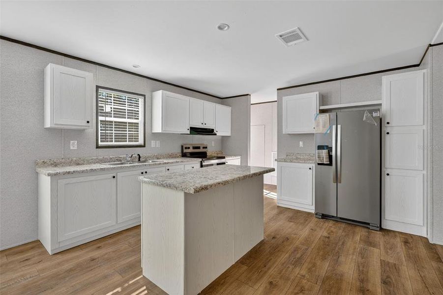 Furnished interior view inside a new home in , Williston (Image 3).